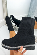 Glitzernde Stretch Teddy Borg Sock Boots in Schwarz für stilvolle und gemütliche Herbst- und Winterschuhe.