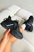 Klobige Sneaker Schwarz mit Kristallakzenten