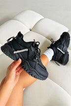 Klobige Sneaker Schwarz mit Kristallakzenten