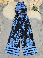 Tropisches Haltertop und weite Hose für Frauen in elegantem Design. 10