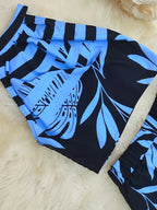 Tropisches Haltertop und weite Hose für Frauen in elegantem Design. 12